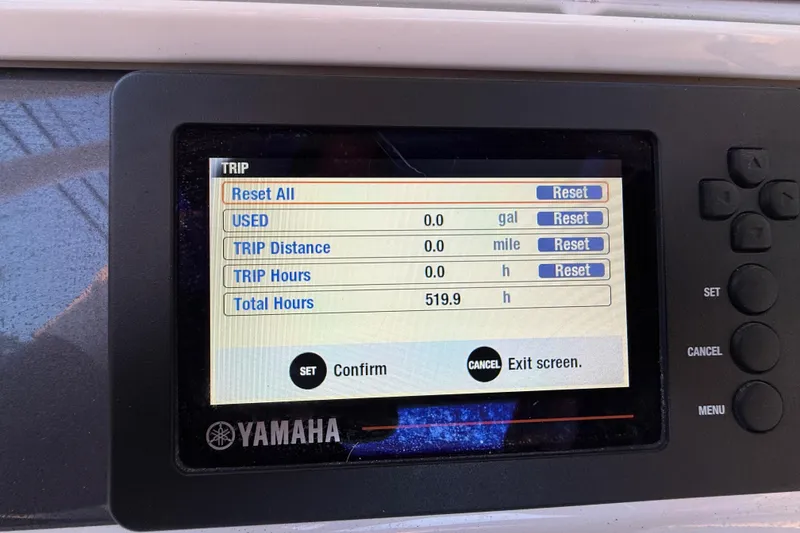 Slide: The Image of Yamaha display on 2018 Robalo R242 Center Console showing trip and total hours. - 28