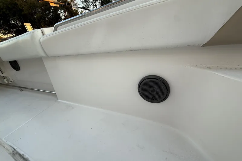 Slide: The Image of 2018 Robalo R242 Center Console boat interior with speaker detail. - 51