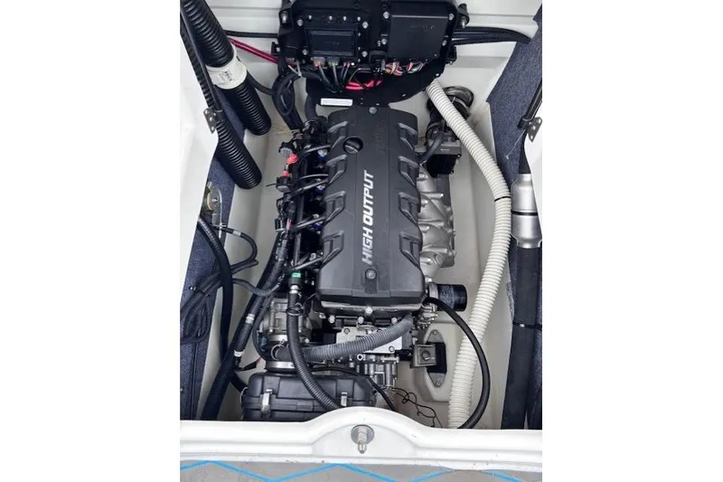 Slide: The Image of 2017 Yamaha Boats SX190 engine compartment showcasing high output engine components. - 14