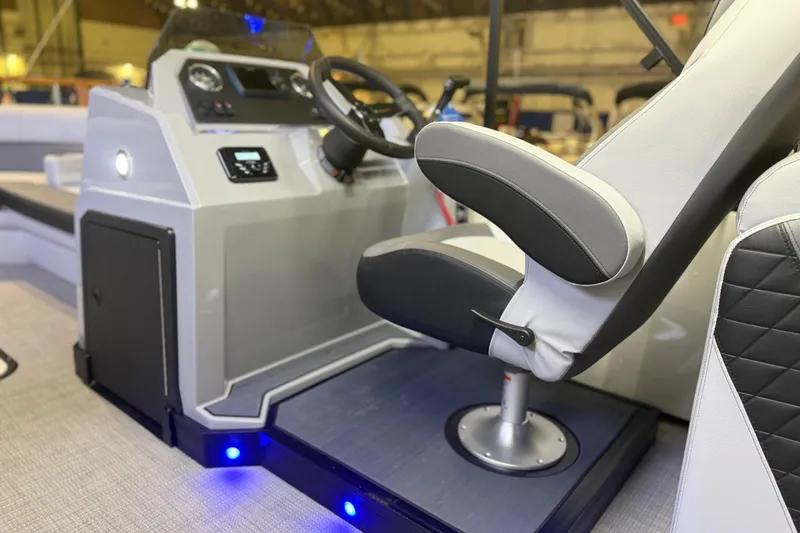 Slide: The Image of Captain's seat and console of 2026 Veranda VS 22 RC boat, featuring modern controls. - 3
