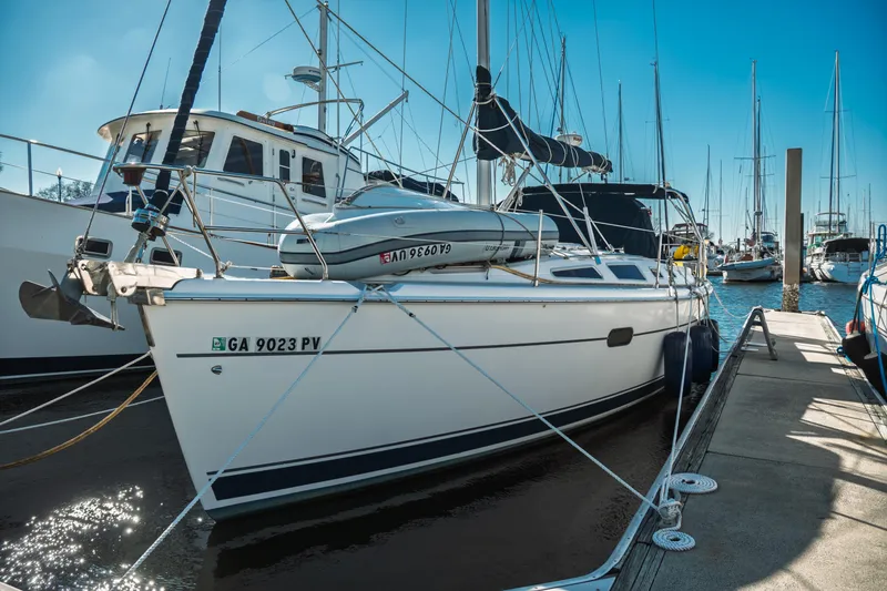 The Image of Sailboat docked at marina, 2003 Hunter 356 model, sunny day, clear blue sky. - 0
