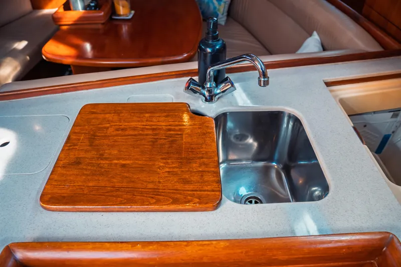 Slide: The Image of Galley sink and countertop in 2003 Hunter 356 sailboat interior. - 30