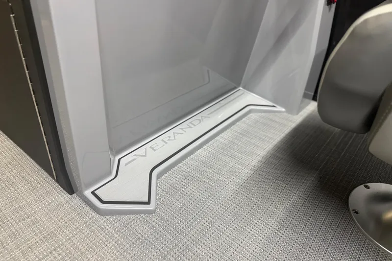 Slide: The Image of 2026 Veranda Relax VR22RC boat interior with sleek design and branded flooring. - 3