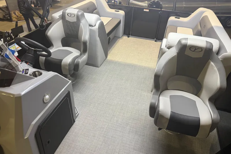 Slide: The Image of 2026 Veranda Relax VR22RC interior with modern seating and steering console. - 8