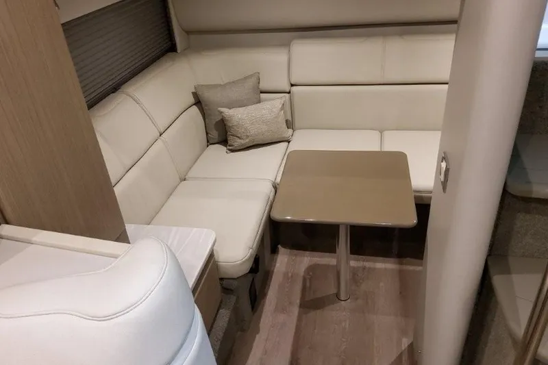 Slide: The Image of 2022 Formula 37 Performance Cruiser interior with beige seating and table. - 20