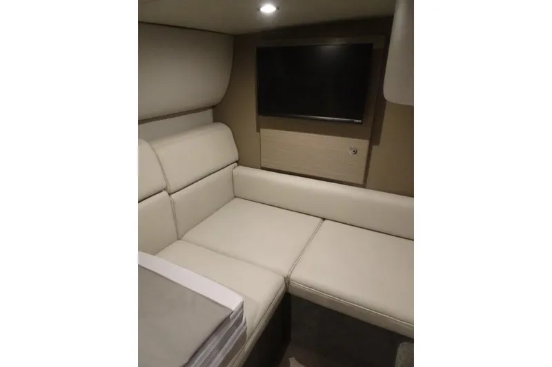 Slide: The Image of Interior of 2022 Formula 37 Performance Cruiser with beige seating and wall-mounted TV. - 27