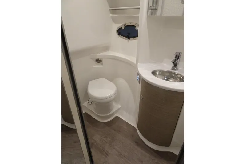 Slide: The Image of 2022 Formula 37 Performance Cruiser bathroom with modern fixtures and compact design. - 30