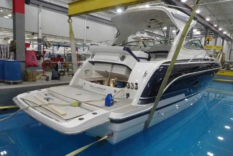 Slide: The Image of 2022 Formula 37 Performance Cruiser in a workshop, showcasing sleek design and modern features. - 6