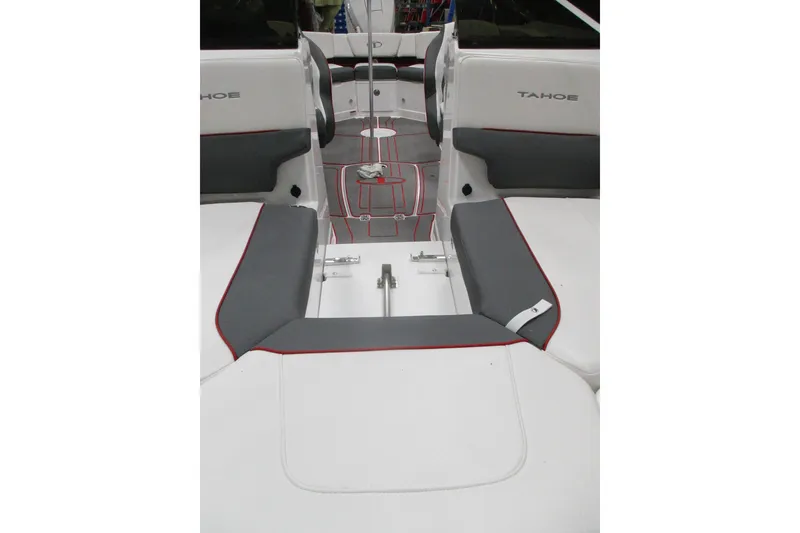 Slide: The Image of 2024 Tahoe 210 S Limited boat interior with gray and white seating. - 5