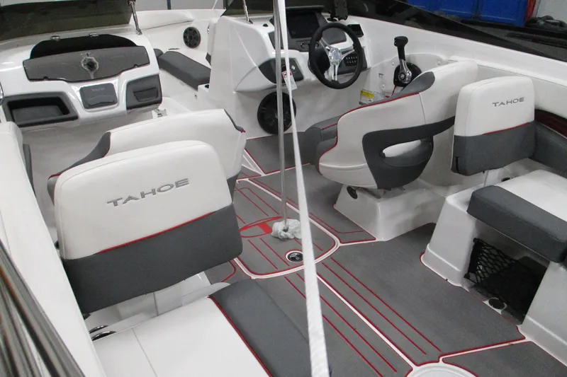 Slide: The Image of Interior of 2024 Tahoe 210 S Limited boat with modern seating and steering console. - 6