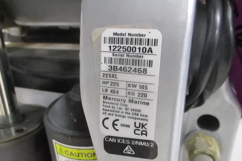 Slide: The Image of Label on Mercury Marine engine, model 225XL, showing specifications and serial number. - 9