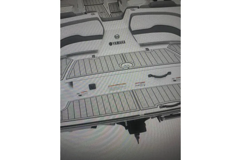 Slide: The Image of 2026 Yamaha Boats 195S rear deck with seating and swim platform. - 10