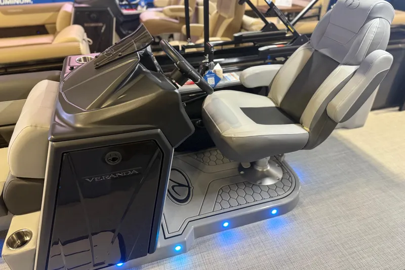 Slide: The Image of 2026 Veranda VR 235 L boat helm with modern seating and illuminated controls. - 4