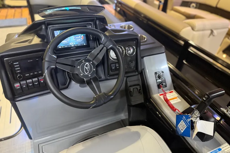 Slide: The Image of 2026 Veranda VR 235 L boat dashboard with steering wheel and control panel. - 5