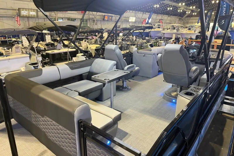 Slide: The Image of 2026 Veranda VR 235 L pontoon boat interior with luxurious seating and modern amenities. - 9