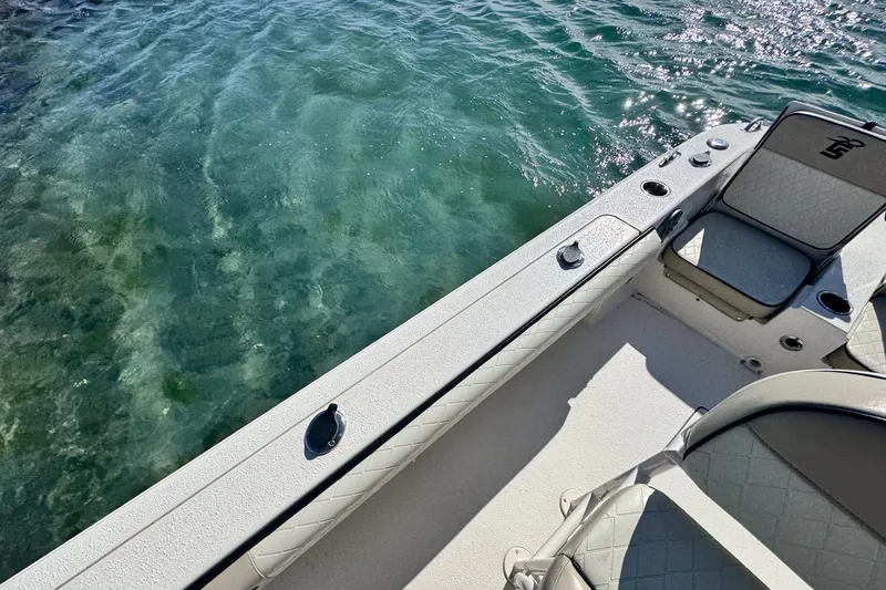 Slide: The Image of 2022 Carolina Skiff 24 Ultra Elite boat interior with clear water view. - 19