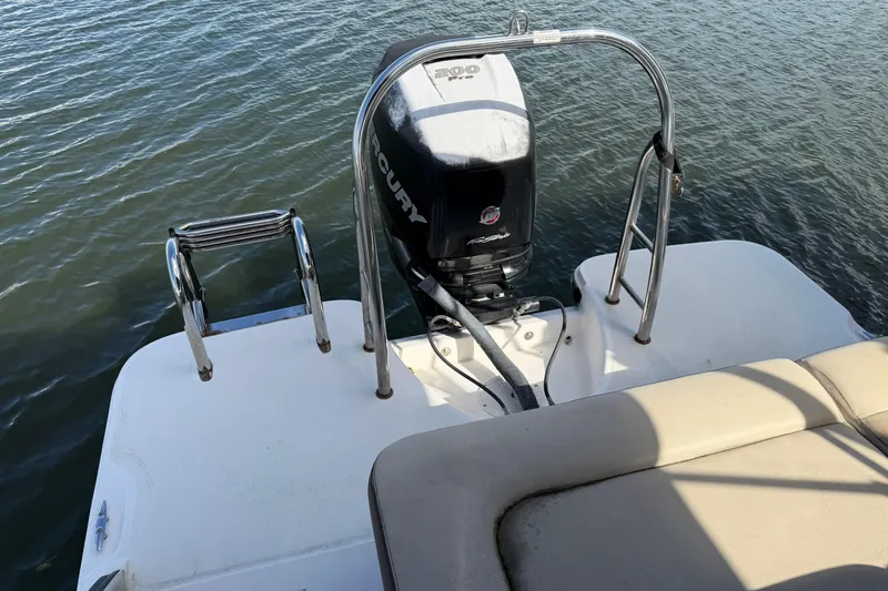 Slide: The Image of 2017 Bayliner Element XR7 boat with Mercury outboard motor on water. - 12