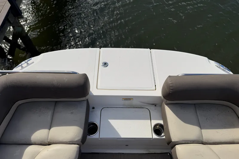 Slide: The Image of 2017 Bayliner Element XR7 boat deck with cushioned seating and water view. - 9