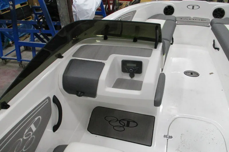 Slide: The Image of 2024 Tahoe T21 boat interior with seating and control panel. - 25