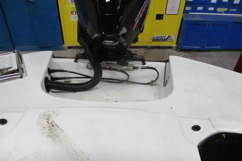 Slide: The Image of 2024 Tahoe T21 boat engine compartment with SeaStar hydraulic steering system. - 9