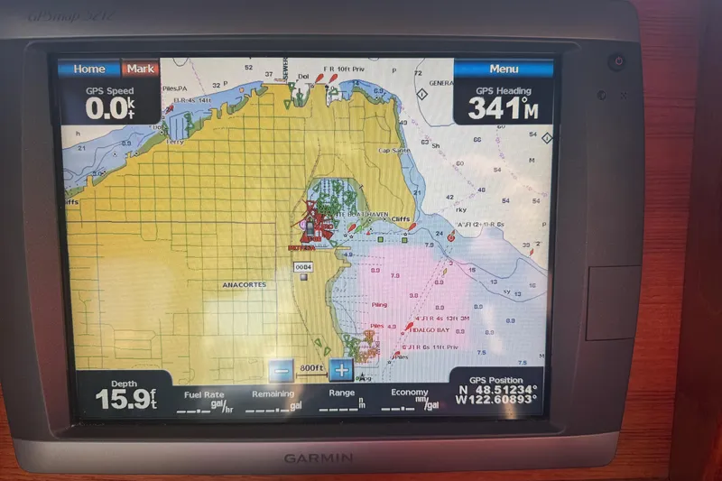 Slide: The Image of Garmin GPS display on 2010 Ranger Tugs R-25 SC, showing navigation map and coordinates. - 5