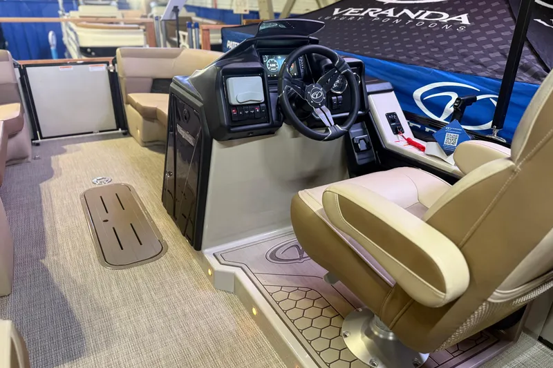 Slide: The Image of 2026 Veranda VR 235 RC pontoon boat interior with modern helm and seating. - 13