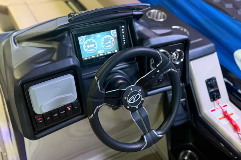 Slide: The Image of Steering console of 2026 Veranda VR 235 RC boat with digital display and controls. - 5
