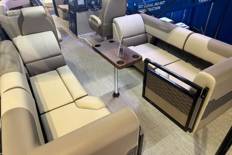 Slide: The Image of Luxurious interior of 2026 Veranda VR 235 RC pontoon boat with plush seating and table. - 8