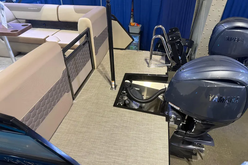 Slide: The Image of 2026 Veranda VR 235 RC pontoon boat with Yamaha outboard motor and luxurious seating. - 9