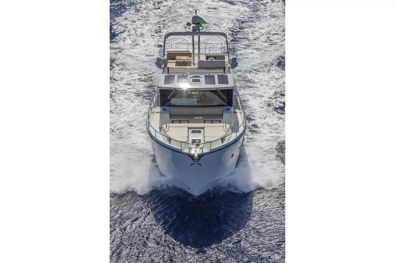 Slide: The Image of 2016 Cranchi Eco Trawler 53 Long Distance cruising on open water, aerial view. - 2