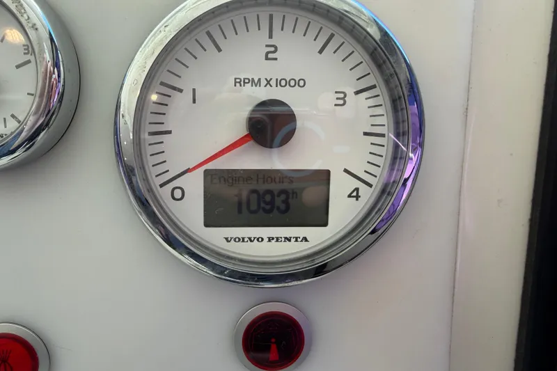 Slide: The Image of Volvo Penta tachometer showing 1093 engine hours on Cranchi Eco Trawler 53. - 21