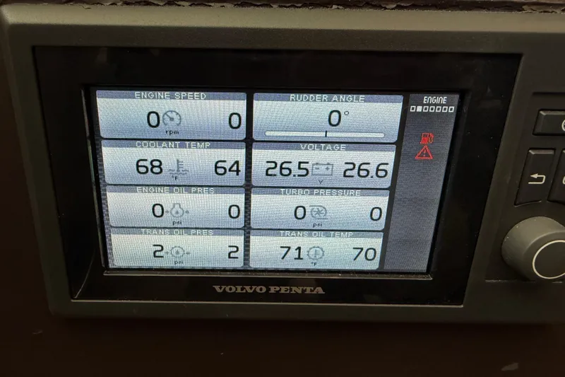Slide: The Image of Volvo Penta engine display on 2016 Cranchi Eco Trawler 53 Long Distance, showing various metrics. - 22