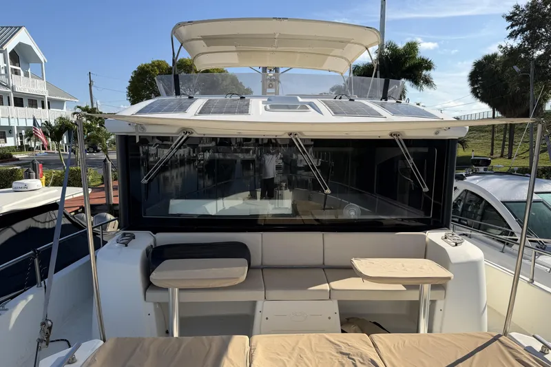 Slide: The Image of 2016 Cranchi Eco Trawler 53 Long Distance yacht with solar panels and seating area. - 29
