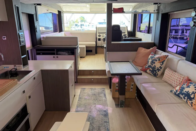 Slide: The Image of Interior of 2016 Cranchi Eco Trawler 53 Long Distance, featuring modern seating and dining area. - 33