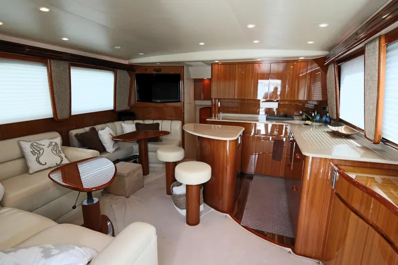 Slide: The Image of Luxurious interior of 2011 Viking 46 Convertible yacht with elegant wood finishes and modern amenities. - 1