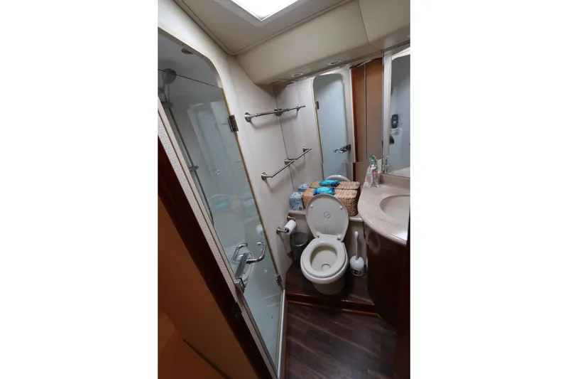 Slide: The Image of Bathroom interior of 2011 Viking 46 Convertible yacht with shower and toilet. - 10