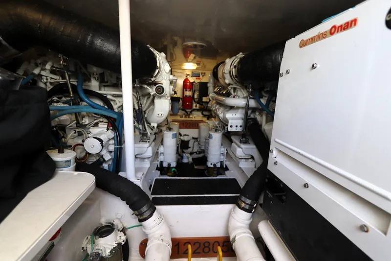 Slide: The Image of Engine room of 2011 Viking 46 Convertible yacht with Cummins Onan generator. - 15