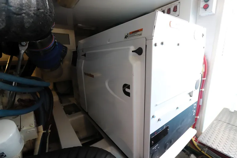 Slide: The Image of Engine room of 2011 Viking 46 Convertible yacht with Cummins generator. - 18