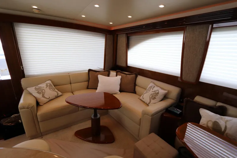 Slide: The Image of Luxurious interior of 2011 Viking 46 Convertible yacht with plush seating and elegant decor. - 2