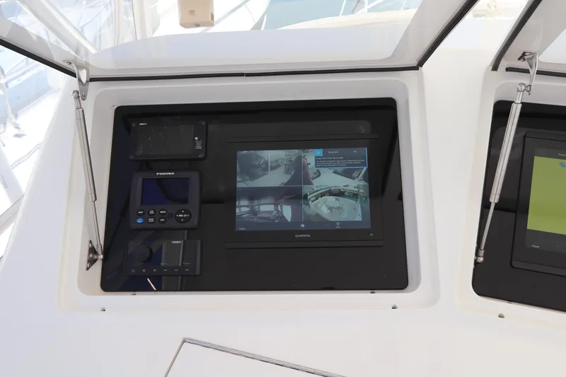 Slide: The Image of Control panel of 2011 Viking 46 Convertible yacht with Garmin and Furuno displays. - 27