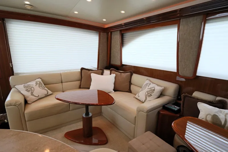 Slide: The Image of Luxurious interior of 2011 Viking 46 Convertible yacht with plush seating and elegant decor. - 3