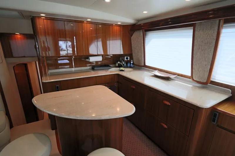 Slide: The Image of Luxurious interior of 2011 Viking 46 Convertible yacht with elegant wood cabinetry. - 4