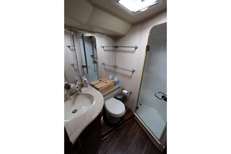 Slide: The Image of Bathroom interior of 2011 Viking 46 Convertible yacht with shower and sink. - 7