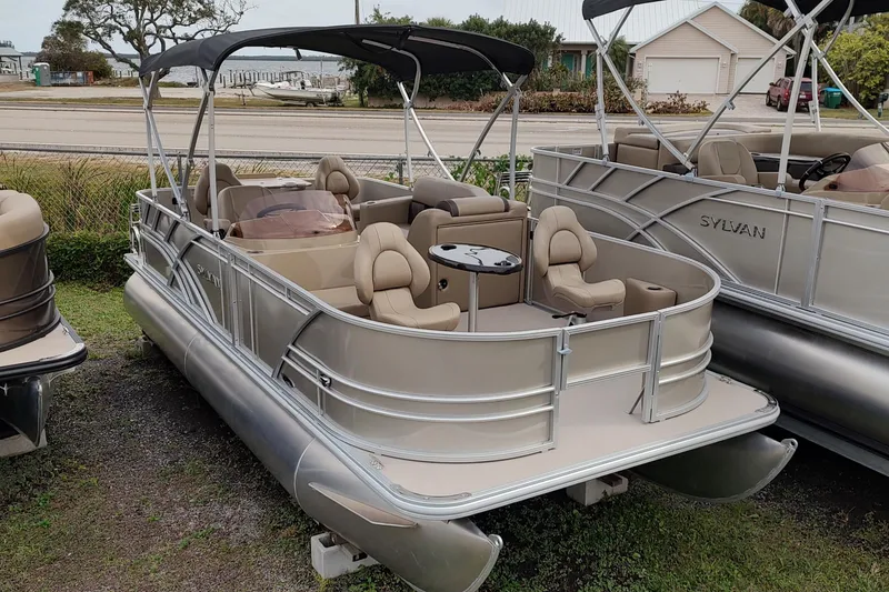 Slide: The Image of 2025 Sylvan MIRAGE 820 PARTY FISH pontoon boat with canopy and seating. - 13