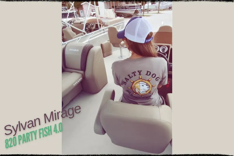 Slide: The Image of Woman on Sylvan Mirage 820 Party Fish 4.0 boat, wearing "Salty Dog" shirt. - 22