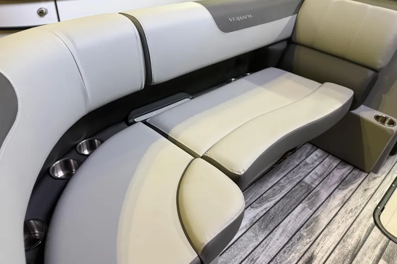 Slide: The Image of 2026 Veranda Relax VR22RC boat seating with cup holders on wood-patterned flooring. - 3