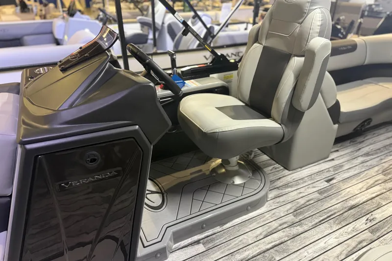 Slide: The Image of 2026 Veranda Relax VR22RC boat interior with sleek helm and comfortable seating. - 4