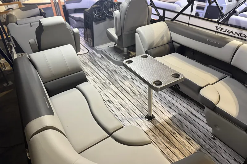 Slide: The Image of 2026 Veranda Relax VR22RC pontoon boat interior with luxurious seating and sleek design. - 7