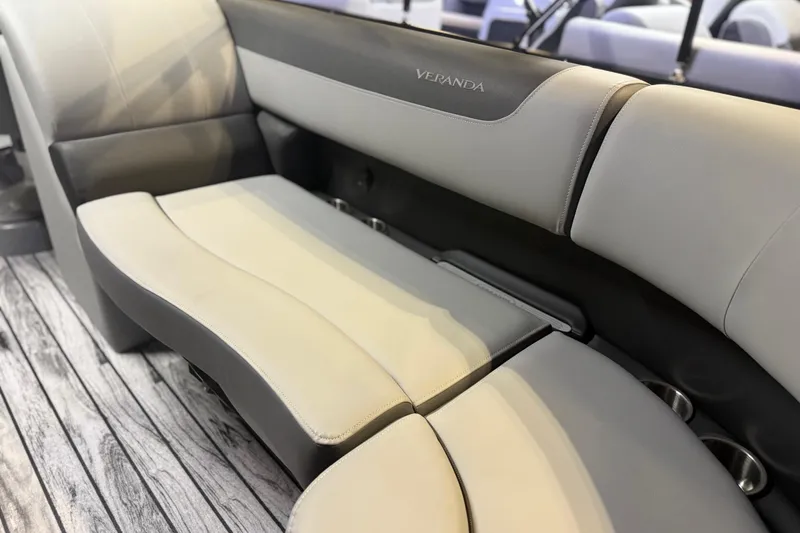 Slide: The Image of 2026 Veranda Relax VR22RC boat interior with sleek, modern seating on wooden flooring. - 8