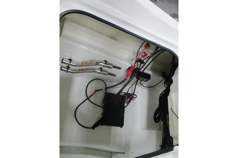 Slide: The Image of 2024 Tahoe 200 S boat interior wiring and components view. - 17